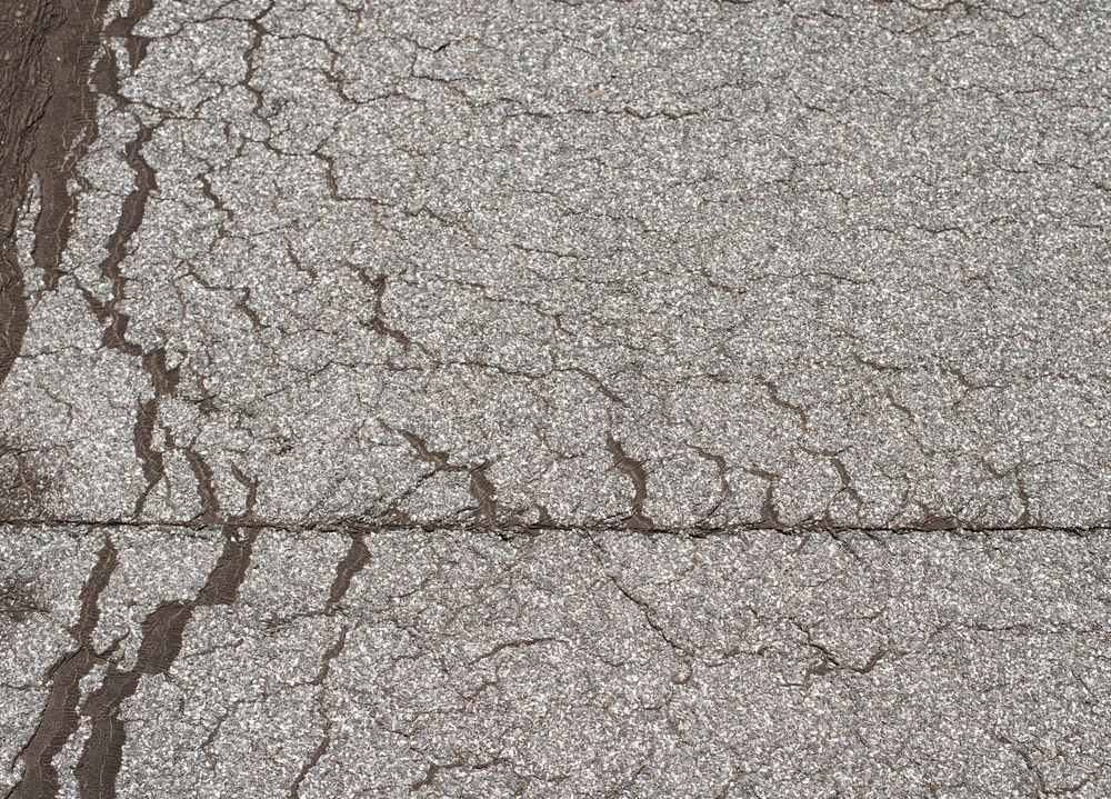 Daklekkage door scheuren in plat dak Duivendrecht Losliggend dakleer op plat dak in Duivendrecht